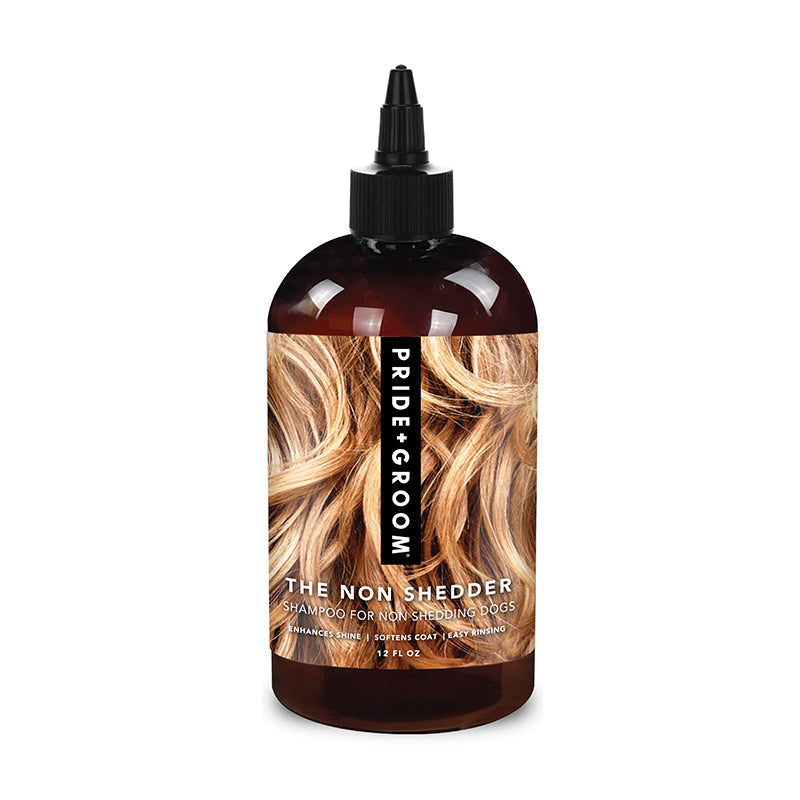Dog shampoo bottle with pump cap, back label reading THE NON SHEDDER