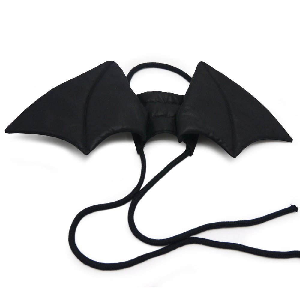 Black dragon wings accessory with two wing pads and long dangling ties