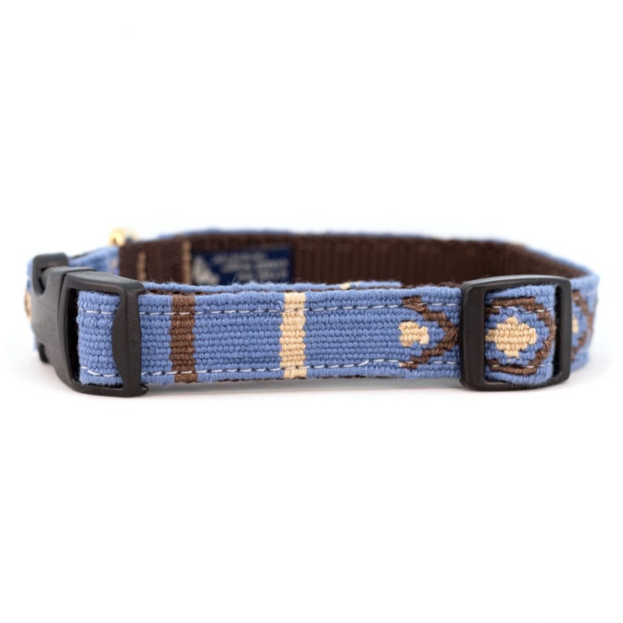 Blue woven cotton dog collar with tan and white block stripe pattern, plastic buckle