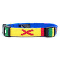 Handmade cotton weave dog collar with blue, yellow, and red crossbones design; buckle and D-ring