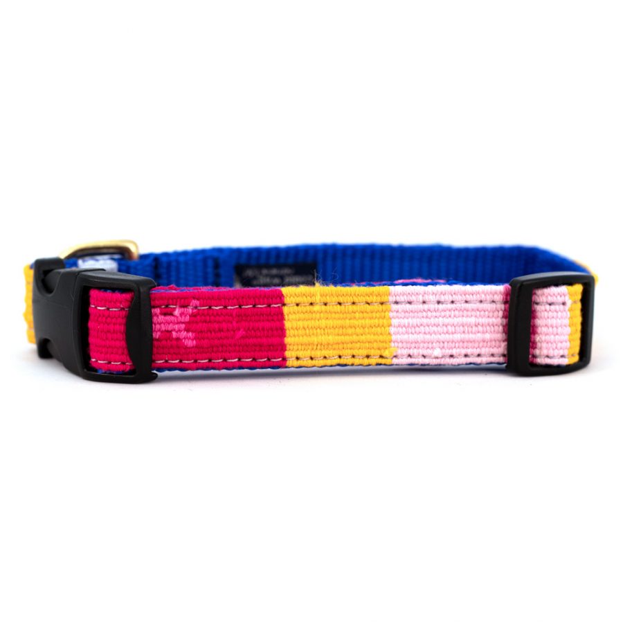 Handmade cotton dog collar with woven stripe pattern in blue, red, yellow, and pink