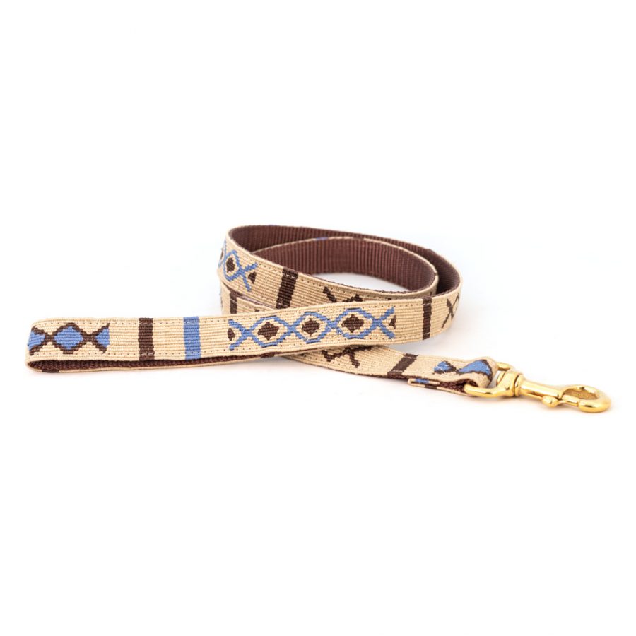 Handmade cotton dog leash with woven blue and tan geometric pattern and brass clip