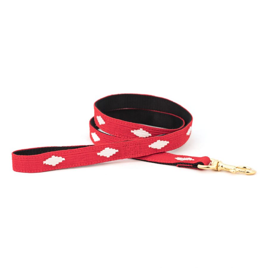 Red cotton dog leash with white diamond pattern and brass clasp