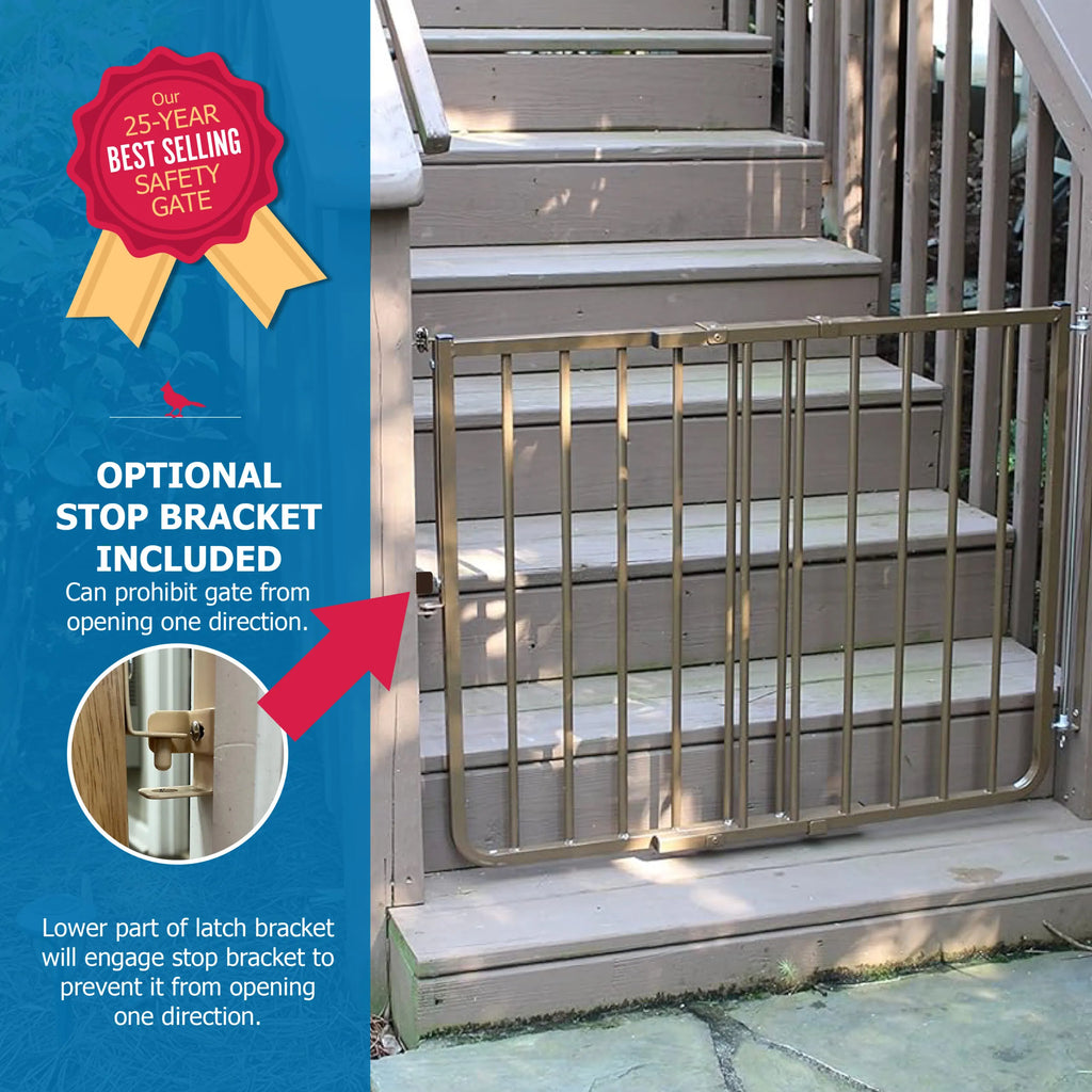 Aluminum safety gate with latch hardware blocking a stair opening