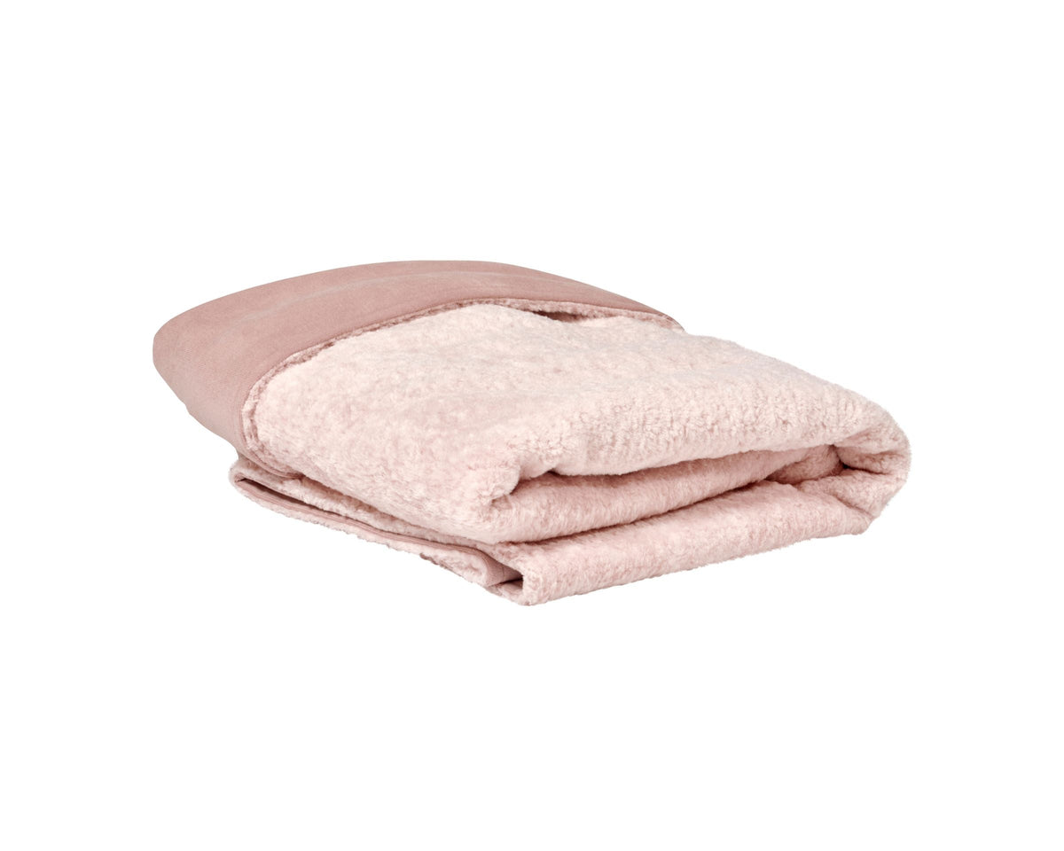 Reversible faux fur dog blanket, blush and cream folded plush layers
