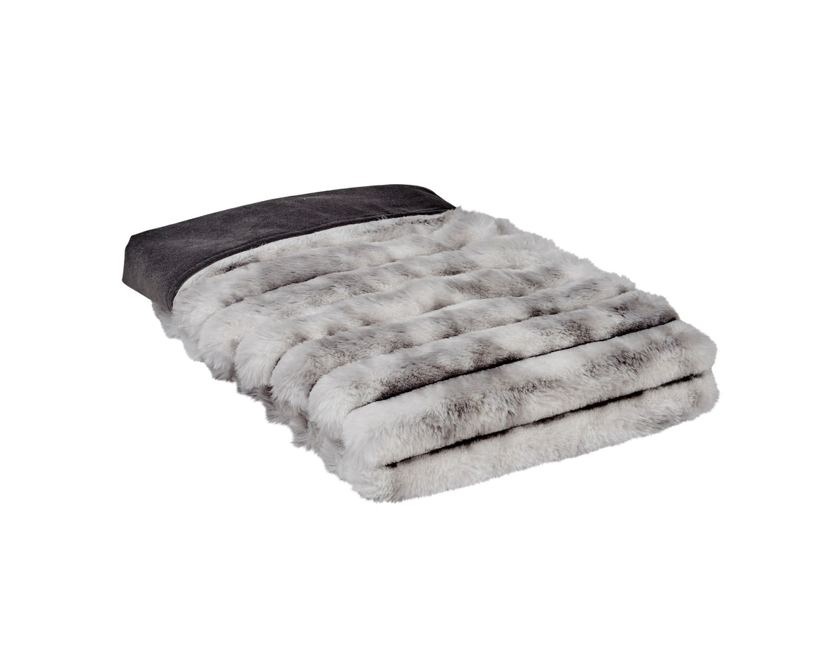 Reversible dog faux fur blanket, dark backing and light gray folded pile