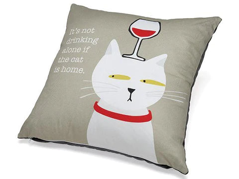 Beige accent pillow with white cat, red wine glass, and quote text