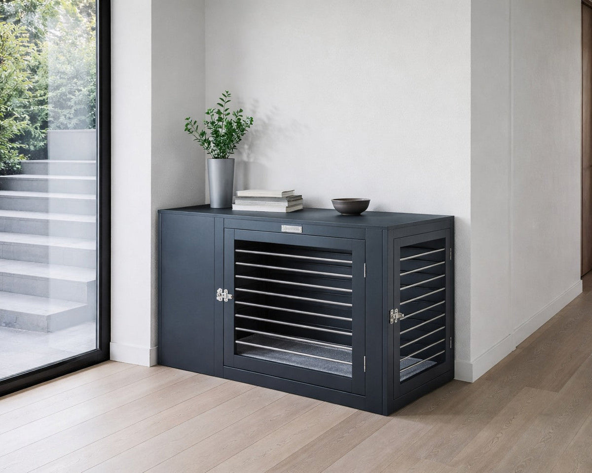 Gray modern luxury dog crate with metal slat doors against a wall, in a living space