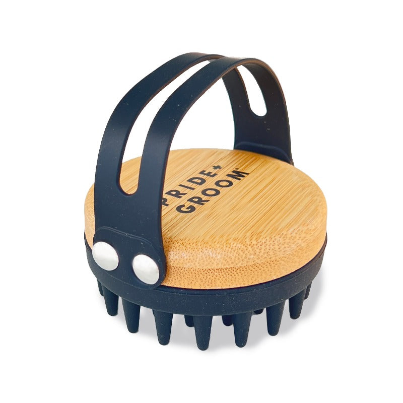 Dual-use silicone grooming brush with dark blue handle and rubber grooming nubs
