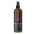 Dog leave-in spray bottle with black pump; brown bottle labeled THE LEAVE IN