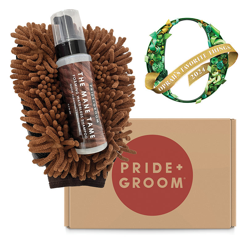 Waterless dog grooming mitt set with brown textured mitt, bottle, and cardboard box