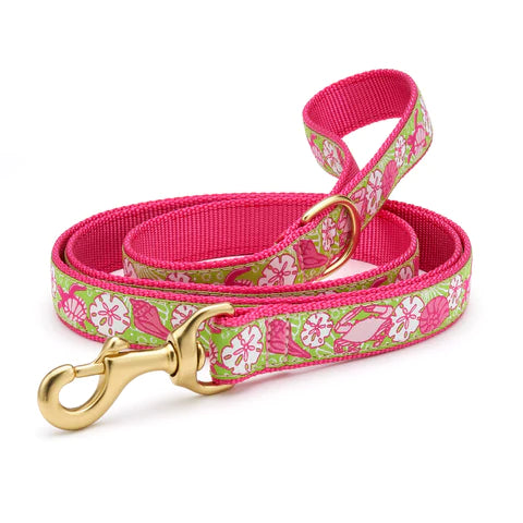 Pink fabric dog leash with colorful marine pattern and gold metal clip