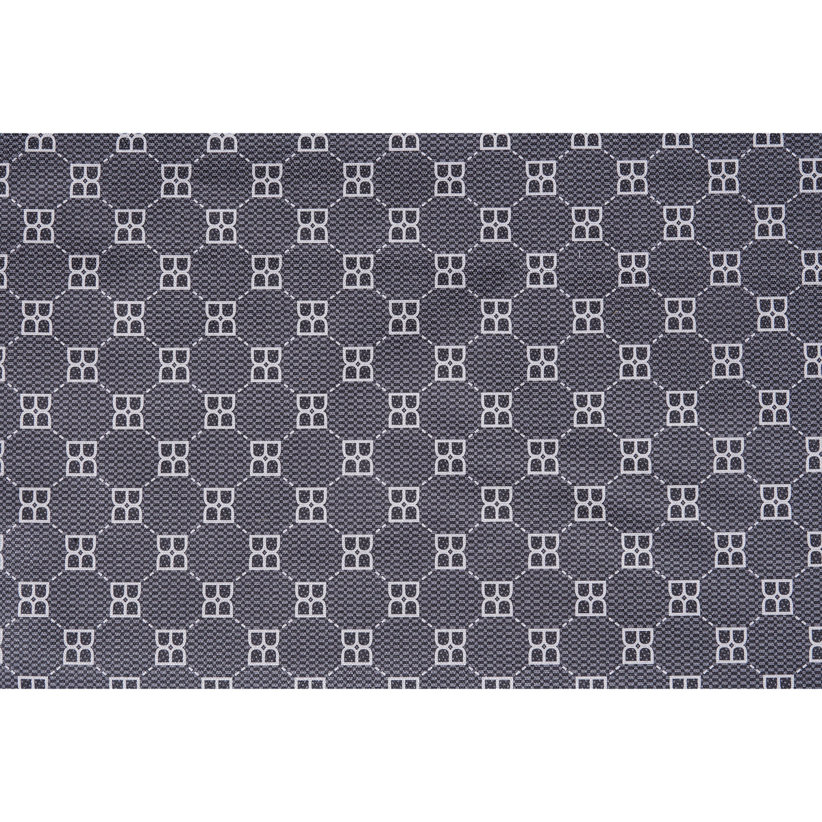Close-up of dark fabric with small geometric pet pattern in white and gray