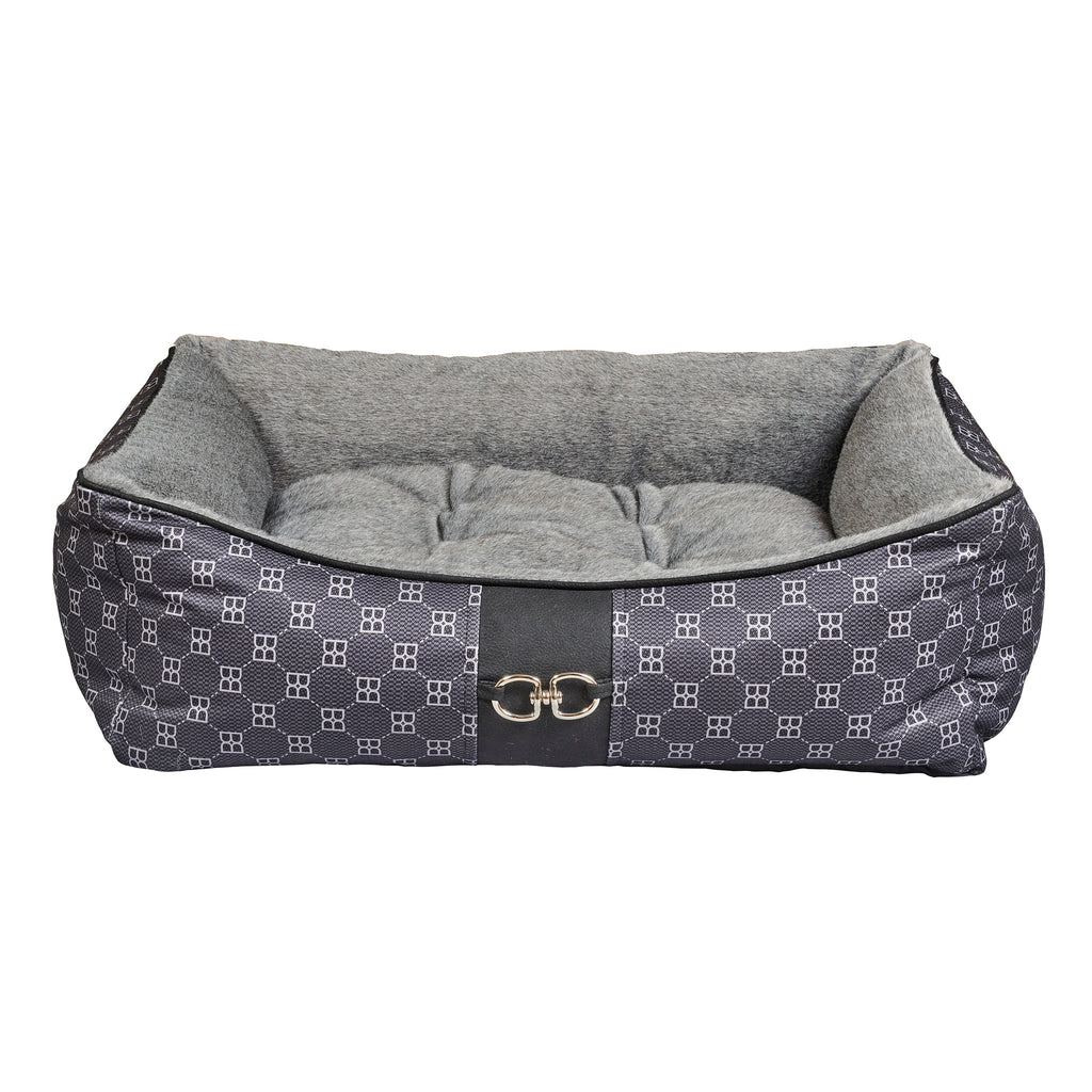 Square scoop dog bed with gray cushion, dark patterned cover, and gold buckle detail