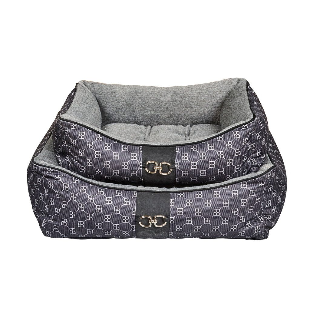 Square scoop dog bed with gray top cushion, dark patterned fabric, and gold buckle front