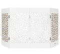 Freestanding indoor dog gate in white with starburst laser-cut panels and folding frame.
