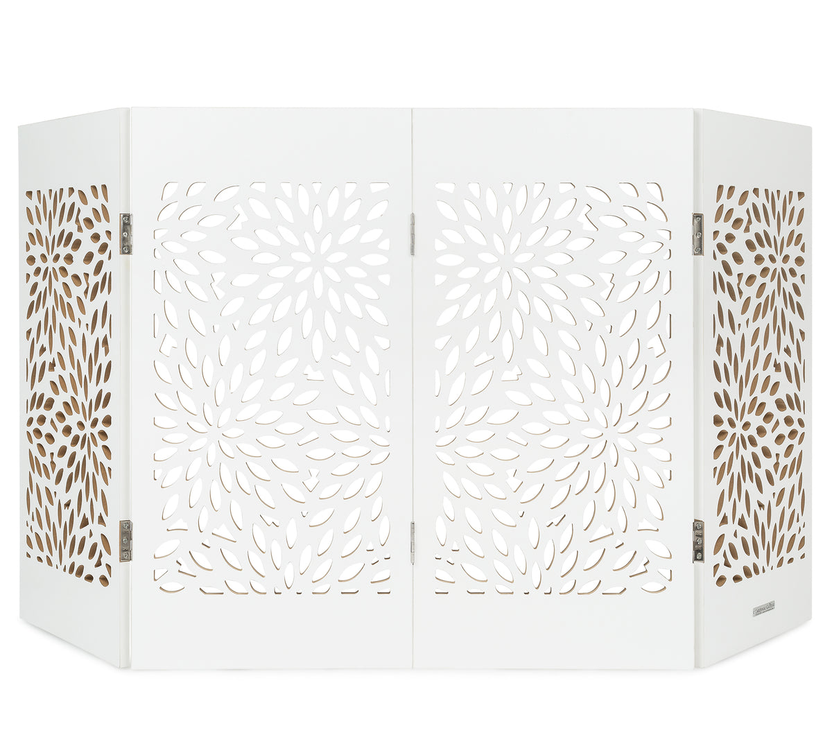 Freestanding indoor dog gate in white with starburst laser-cut panels and folding frame.