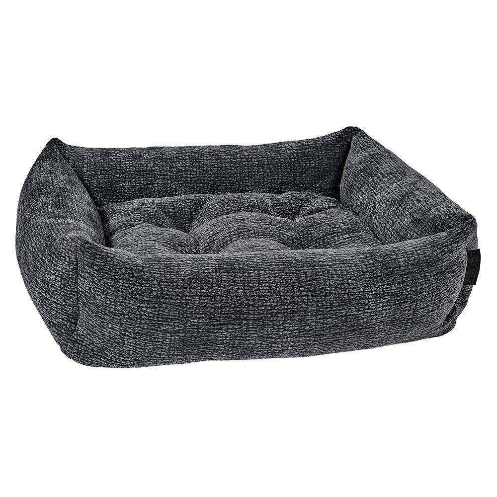 Dark gray woven rectangular dog bed with cushioned bolsters and inner pad