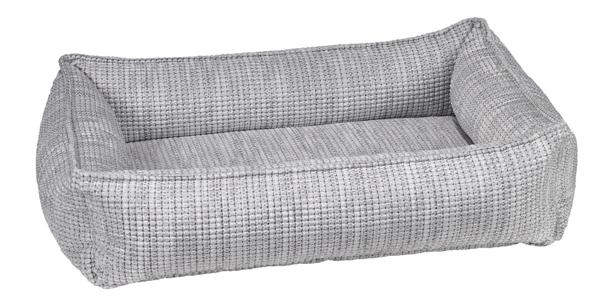 Glacier gray woven dog bed with raised bolster cushions