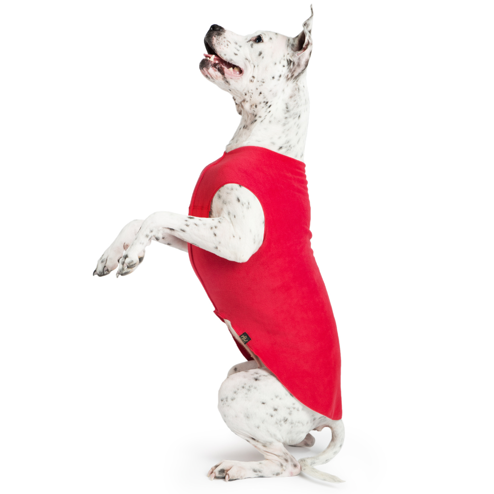 Red stretch fleece dog coat, side view with leg/paw cutouts and draped panels