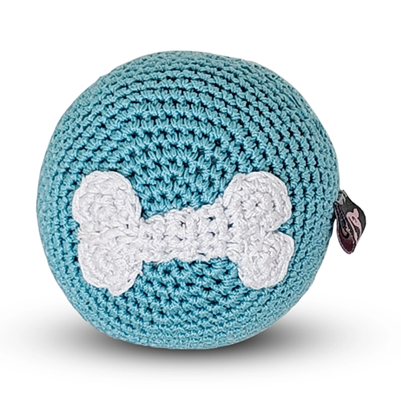 Blue crocheted dog ball toy with white bone applique and squeaker tag