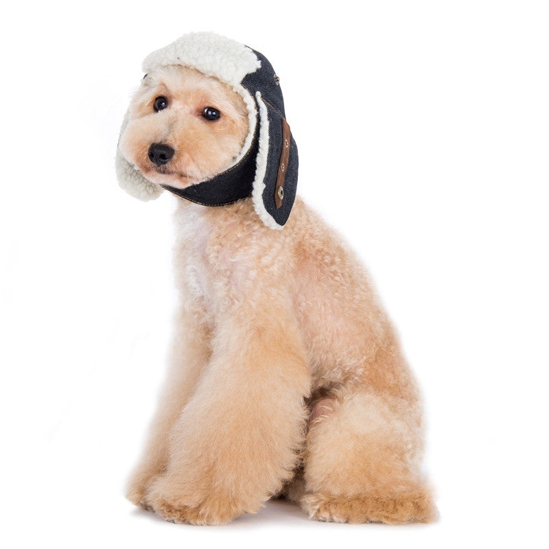 Dog trapper hat in black with white fleece trim, chin strap and ear flaps