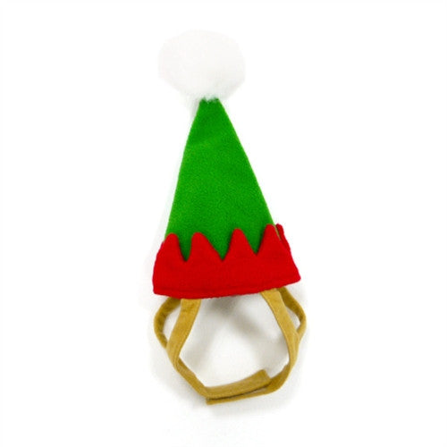 Green elf hat with red jagged brim, tan chin strap and white pom top