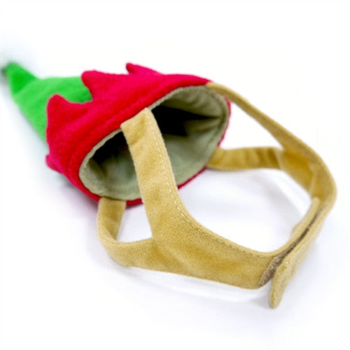 Elf hat headband with green crown, red fabric peak, and inner ear opening
