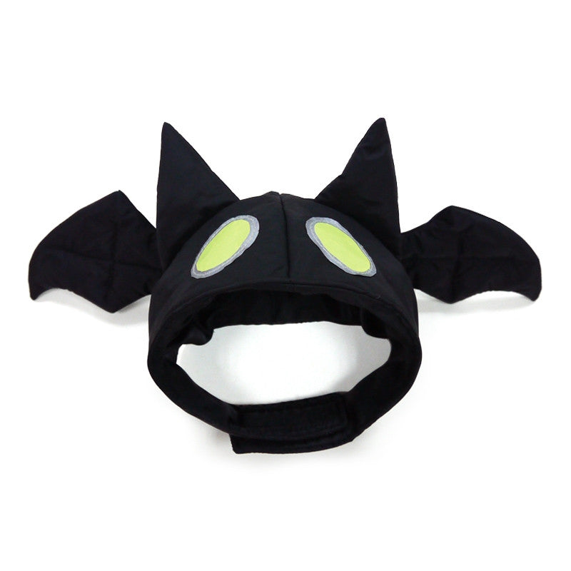 Black bat dog hat with lime oval eye patches and wide side wings