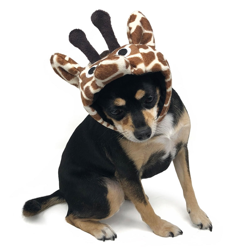 Giraffe plush dog hat with tall antlers on black-and-tan dog head