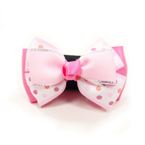 Pink polka-dot dog bow tie with ribbed bow and rhinestone-like trim