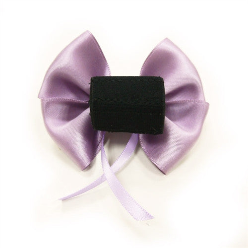 Lavender dog bow tie with black rectangular center tab and looping ribbon tails