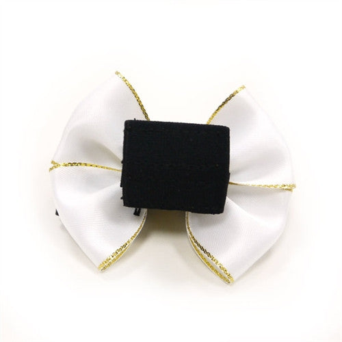 Black dog bow tie center patch on white fabric with gold-thread loops