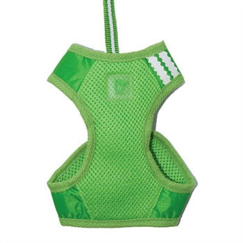 Green soft step-in dog harness with mesh fabric, D-ring patch, and padded side openings.