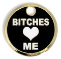 Round black dog ID tag with gold border, 'BITCHES' and 'ME' plus heart