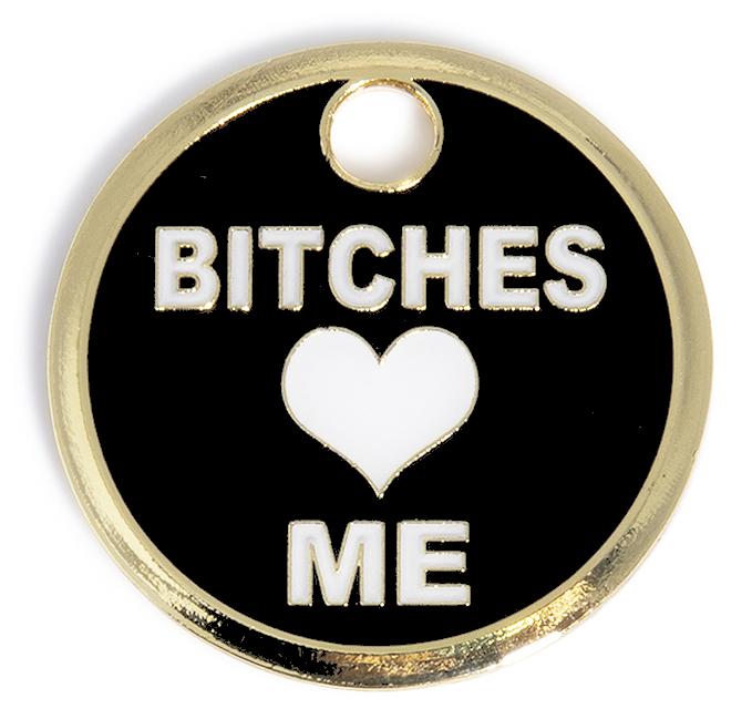 Round black dog ID tag with gold border, 'BITCHES' and 'ME' plus heart