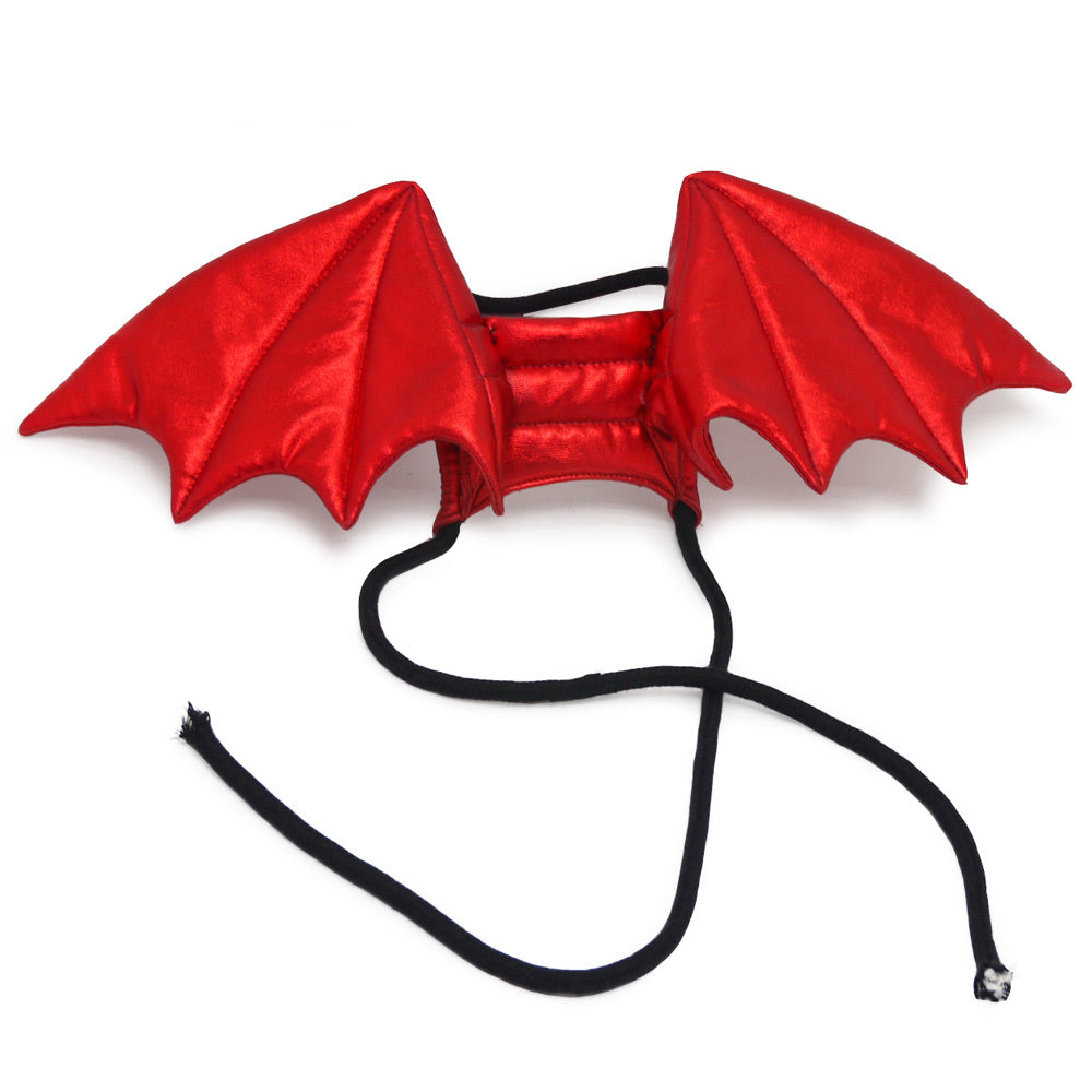 Red dragon wing pet costume with black neck straps and dangling ties