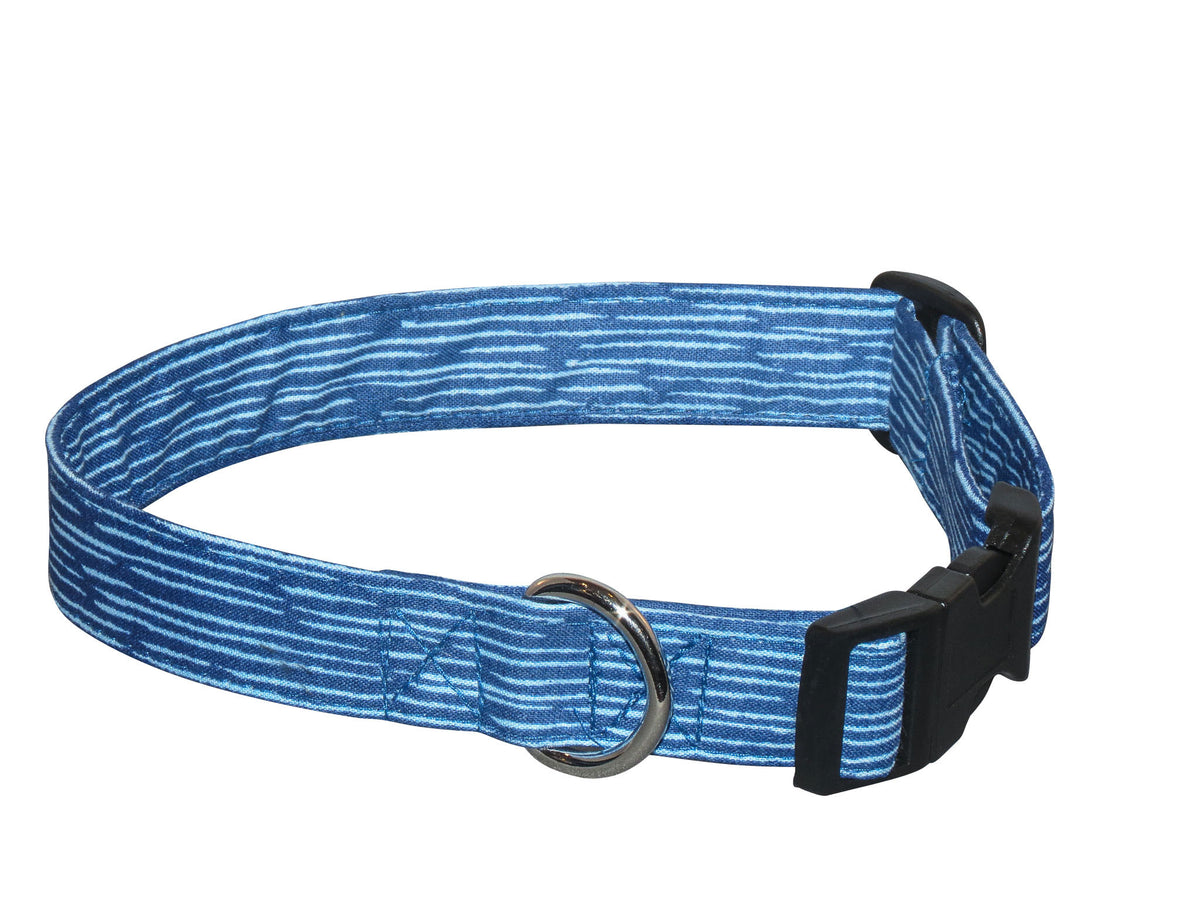 Blue striped fabric dog collar with black adjustable buckle and metal D-ring