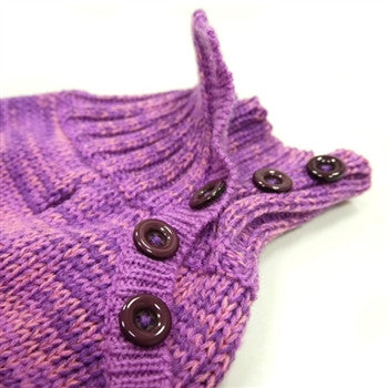 Purple knit dog sweater close-up, ribbed collar and button placket with dark buttons