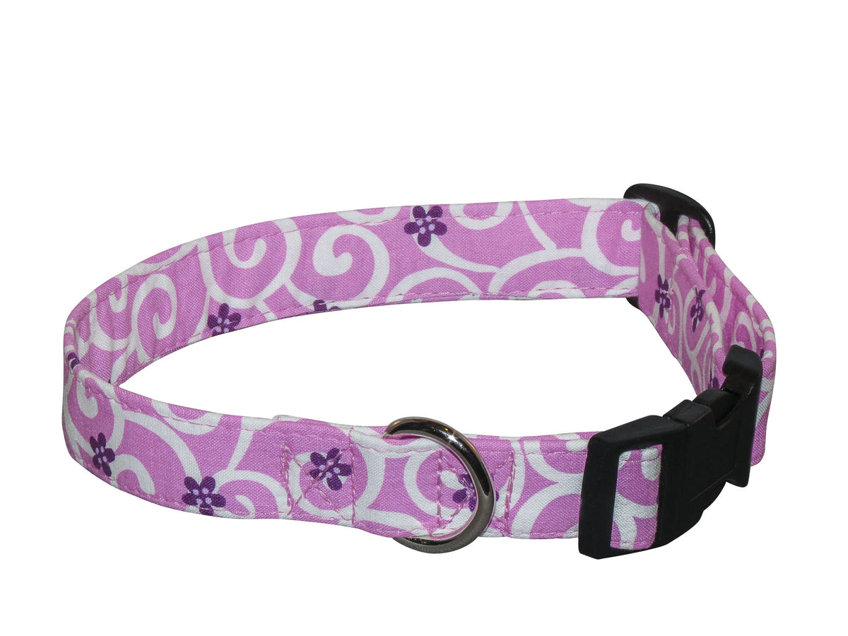 Purple patterned dog collar with metal D-ring and black buckle closure