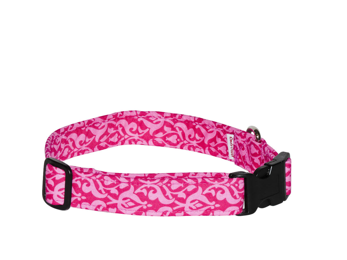 Pink filigree dog collar with adjustable black buckle and matching pattern strap