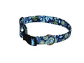Blue floral dog collar with black buckle and D-ring, adjustable strap