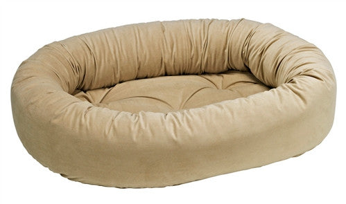 Almond microvelvet donut dog bed with raised rim, round oval cushion