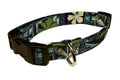Tapa dog collar with green and blue print, black strap, and gold buckle