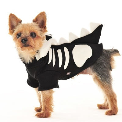 Dog Halloween costume black hoodie with white skull and rib print, standing side view