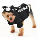 Black dog sweatshirt with skunk hood, white nose and paws, front 'TROUBLE' print