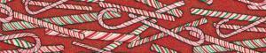 Close-up of red dog collar fabric with green-and-white peppermint stick pattern