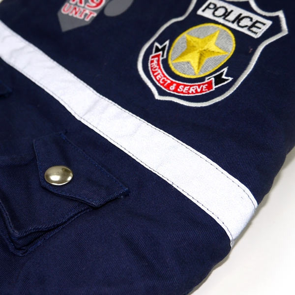 Close-up of navy police dog jacket: reflective stripe and snap button pocket
