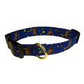 Blue dog collar with colorful animal print and metal buckle