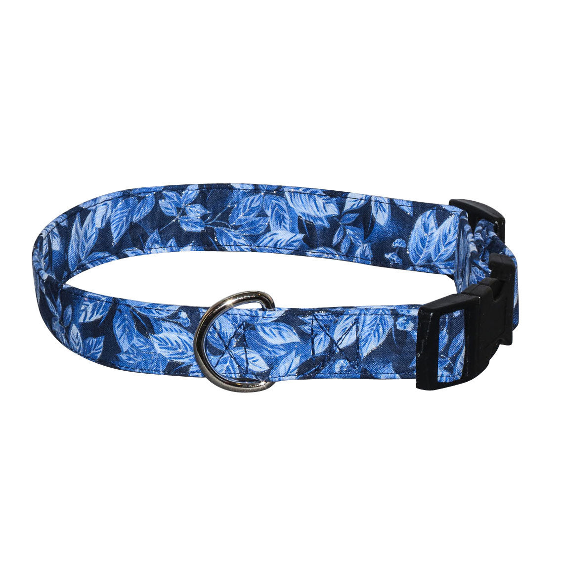 Dog collar with blue leaf pattern fabric, black buckle, and silver metal D-ring